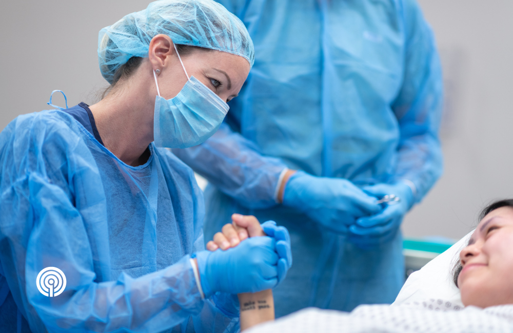 healthcare professional holding hand of patient